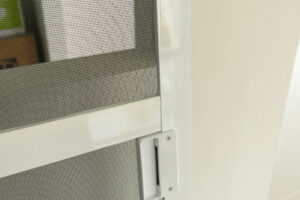 Screen door on home to stop mosquitos.